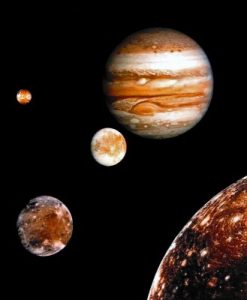 A photo of the planet Jupiter with moons and other planets in the distance