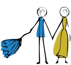 A cartoon couple of somewhat ambiguous gender looks about as though something is missing. They're feeling the need for family and wondering about options.