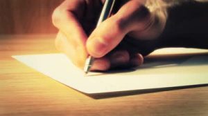 stock-footage-writing-a-letter-close-up